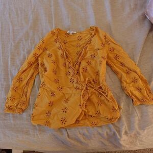 Yellow flower eyelet wrap top from Madewell